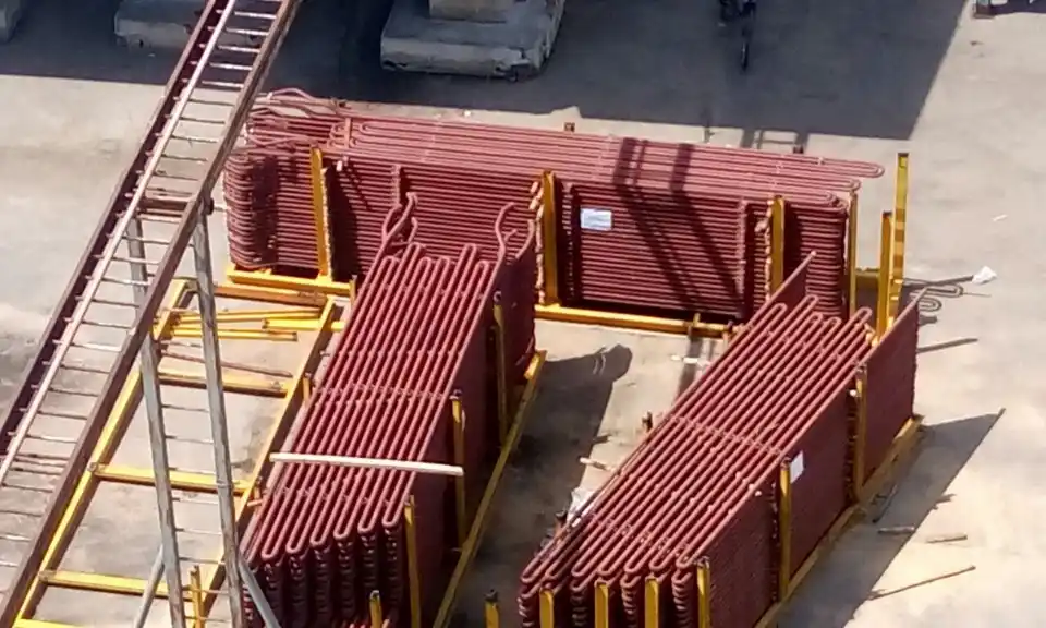 Industrial manufacturing and storage of boiler superheater CSH and RSH coils for Global Technology Thailand.